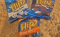 Flipz Covered Pretzels. White Fudge, Milk Chocolate and Peanut Butter.